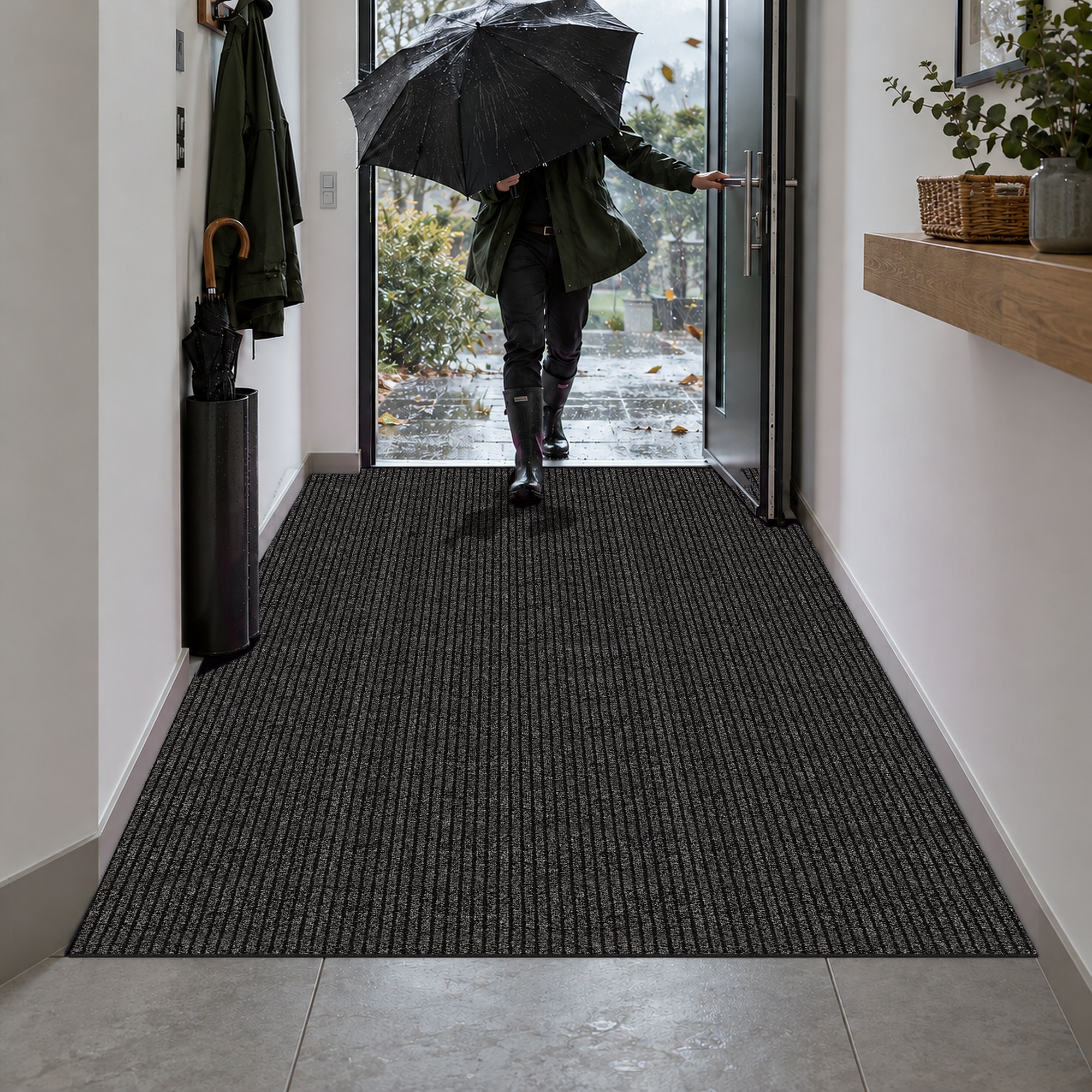 ANRO MISCHA Läufer Schwarz – Gummistiefel mit Schmutz auf der Matte